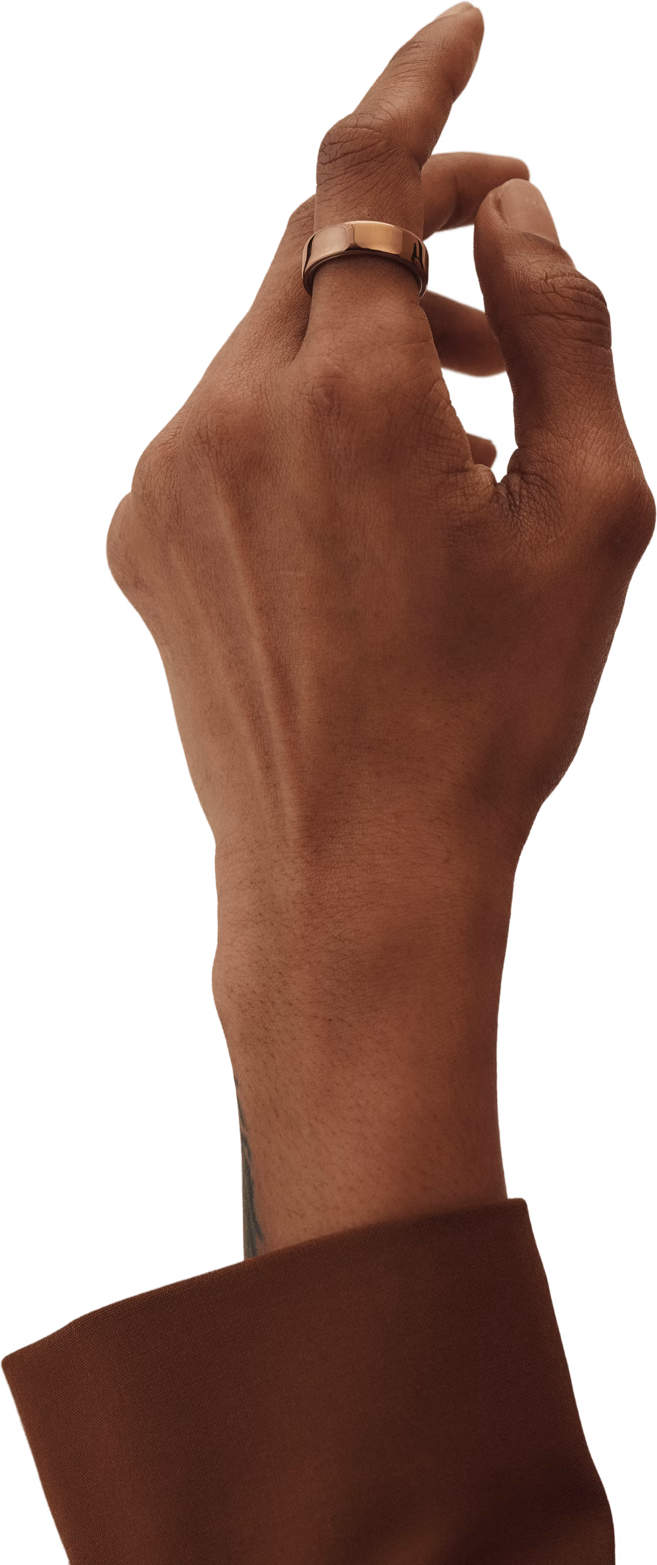 A left hand pointing upwards wearing an Oura Ring 5 in Deep Rose finish on its index finger
